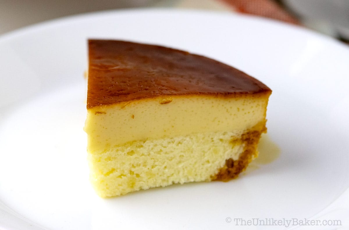 A slice of leche flan cake on a plate.