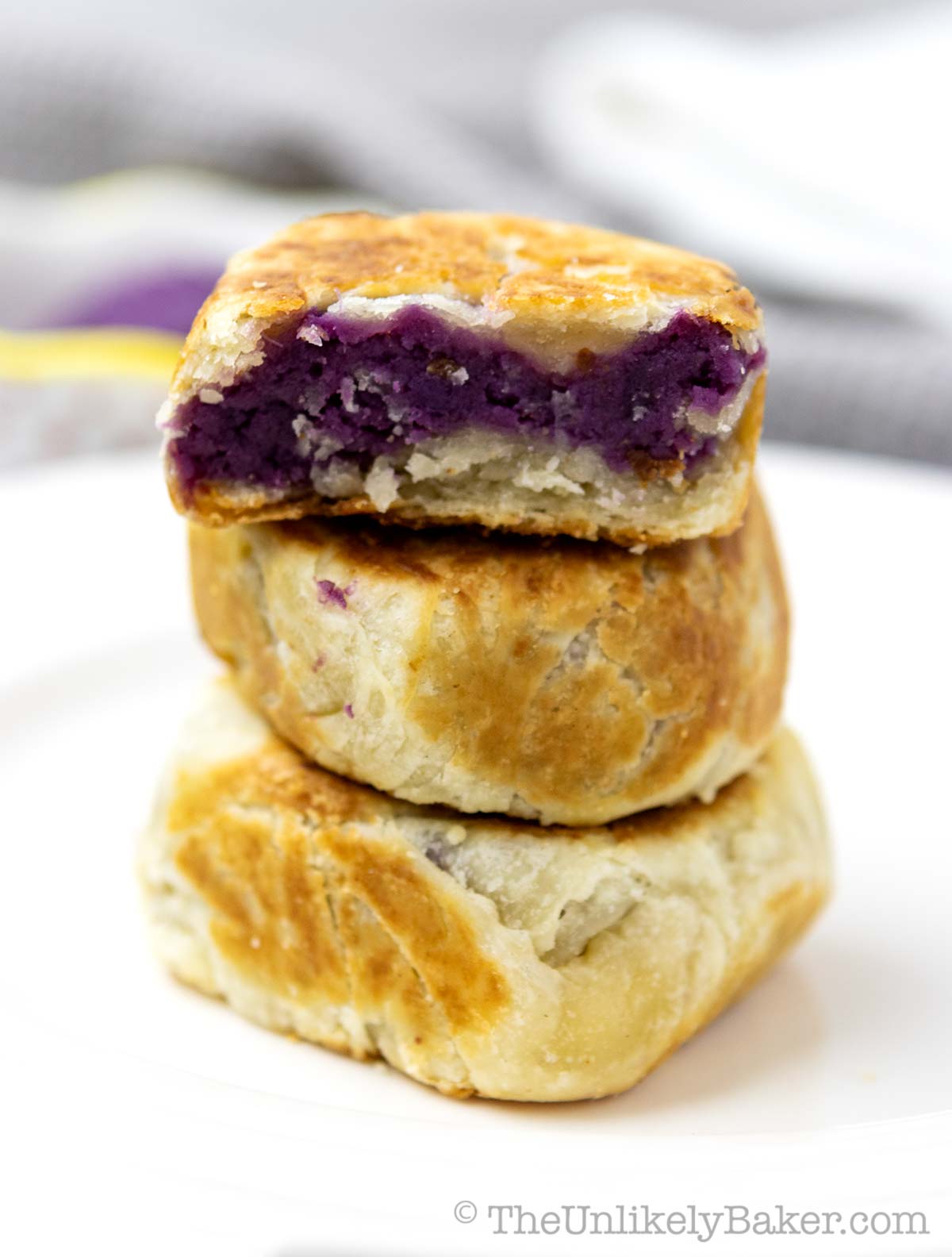 A stack of hopiang ube on a plate.