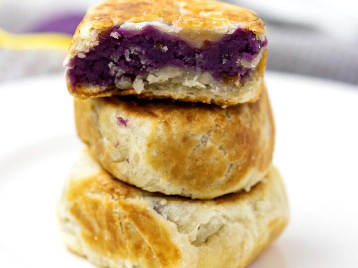A stack of ube hopia on a plate.