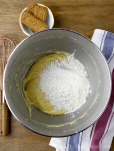 Flour mixture added to wet ingredients.
