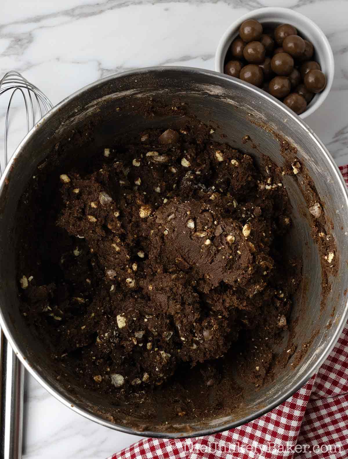 Ovaltine malt chocolate cookie dough in a bowl.