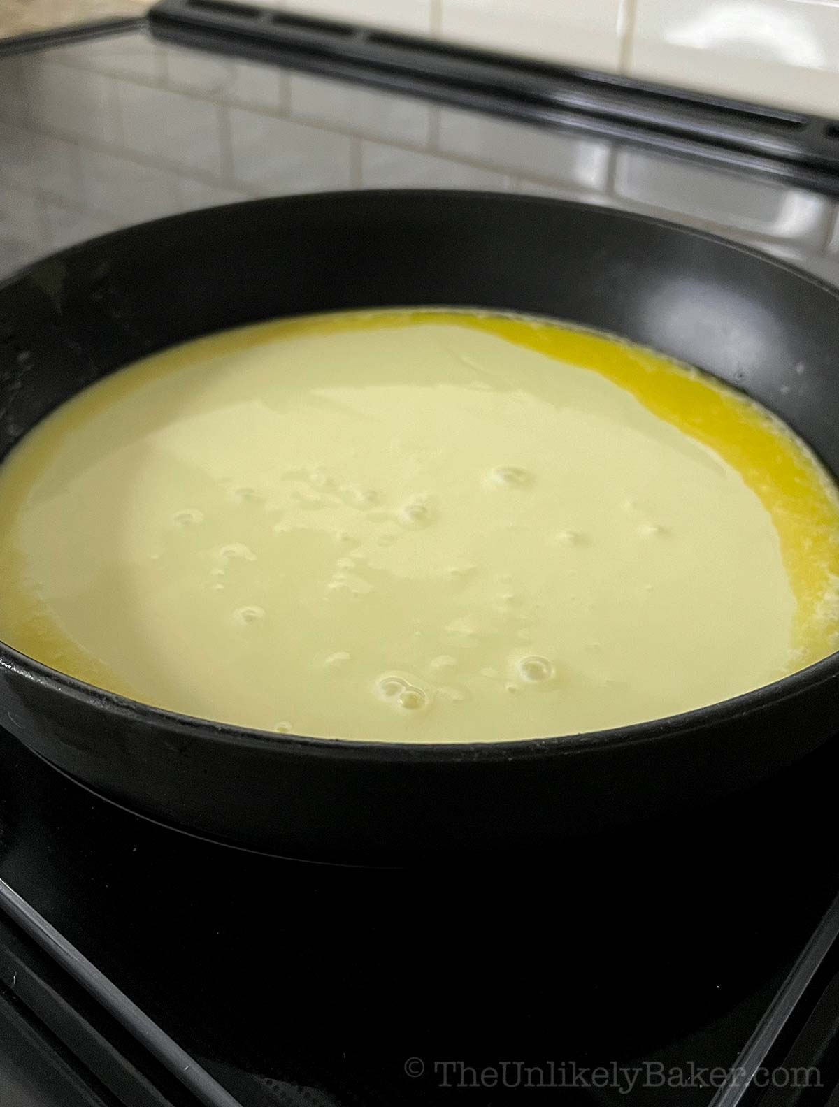 Condensed milk added to melted butter.