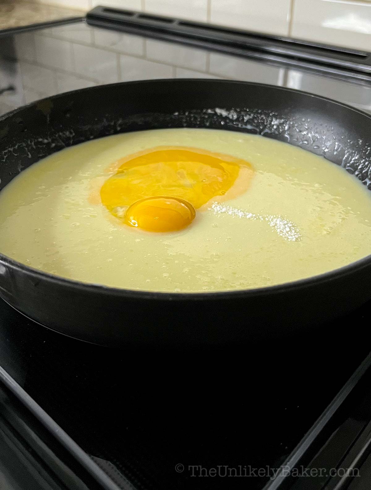 Egg yolks added to condensed milk.