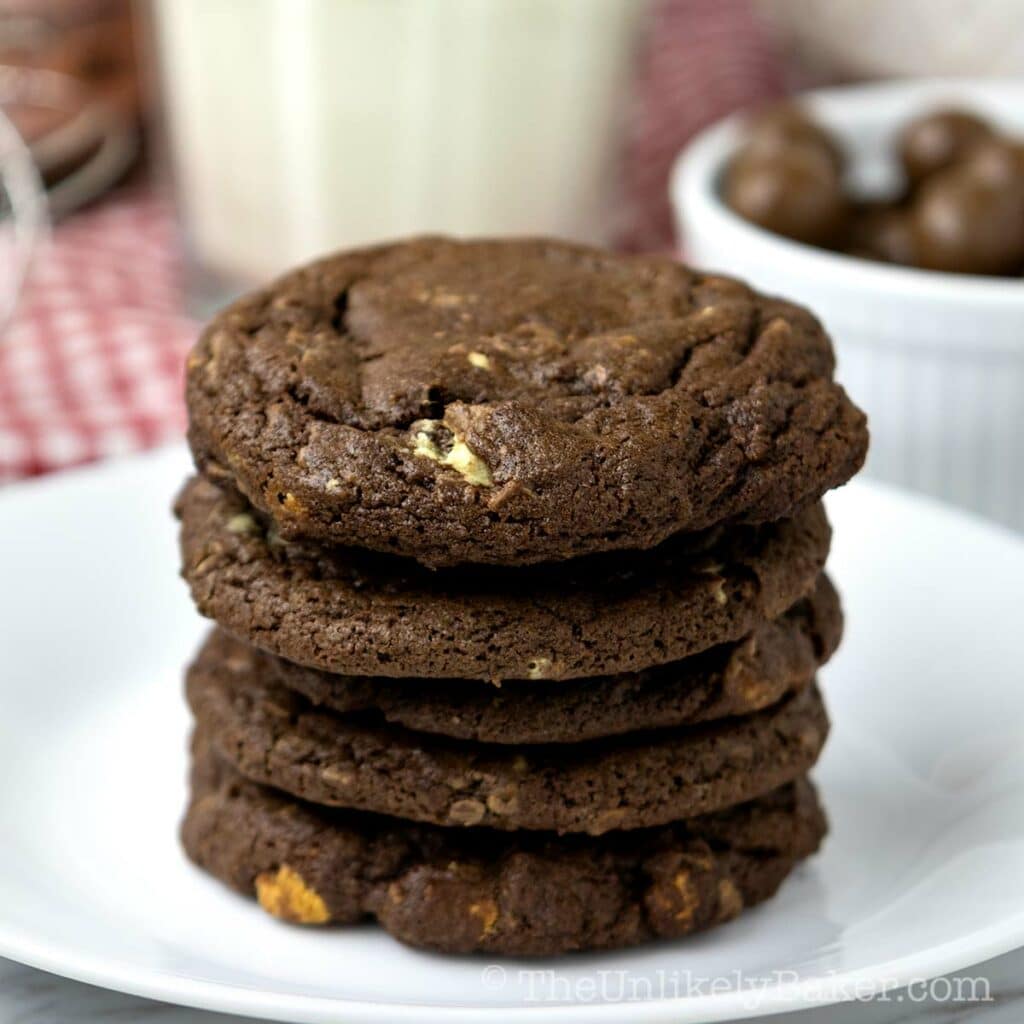 A stack of Ovaltine cookies on a plate.