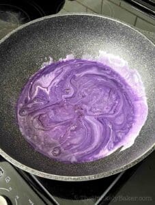 Ube mixture in a wok.