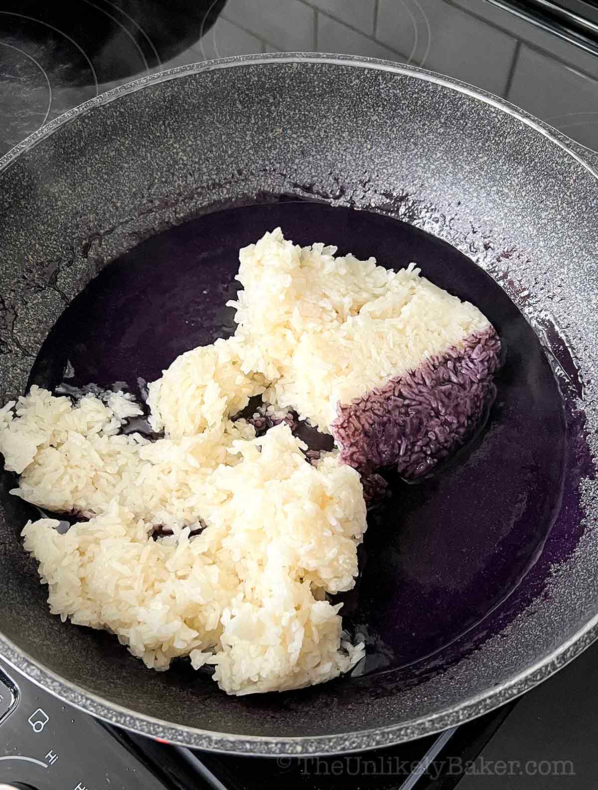 Cooked glutinous rice added to ube mixture.
