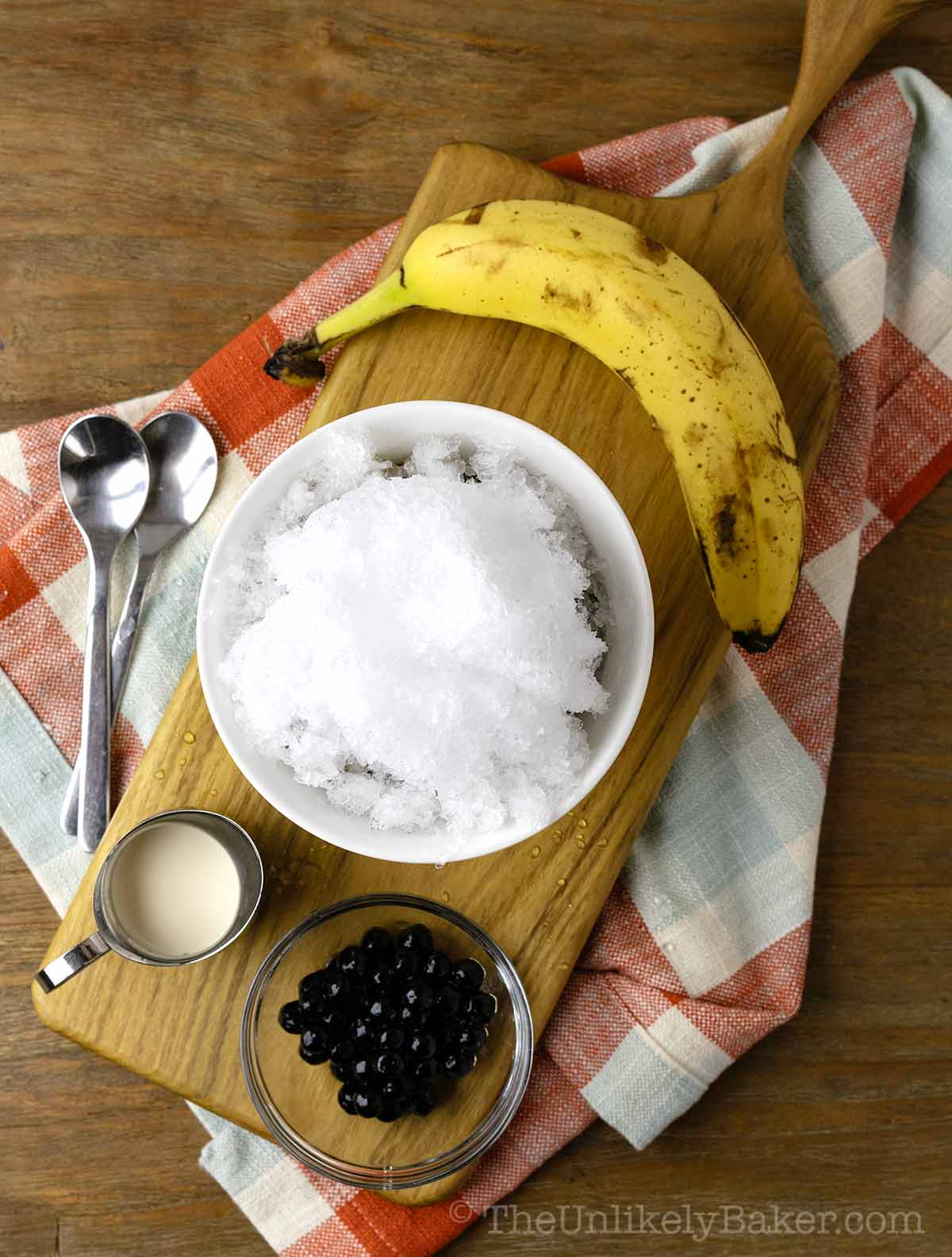 Shaved ice on top of banana mixture.