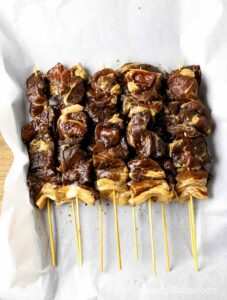 Filipino pork BBQ skewers ready for the grill.