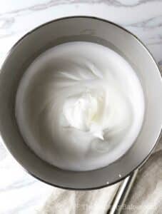 Egg whites whipped to stiff peaks.