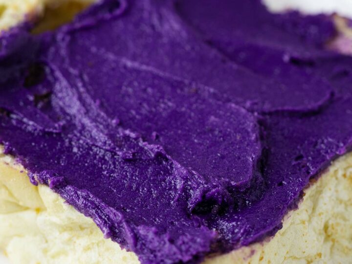 Creamy ube butter spread on pandesal.