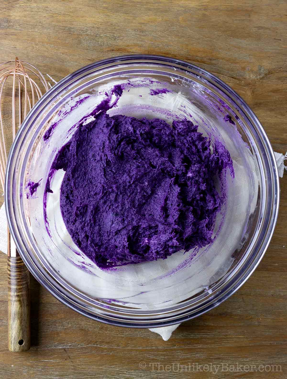 Mashed ube and butter in a bowl.