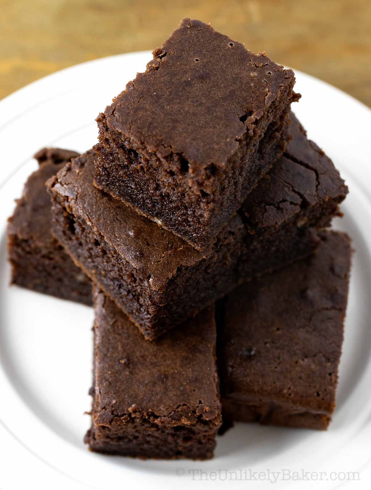 Chewy choco butter mochi on a plate.