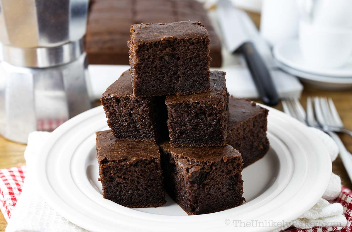 Chocolate mochi on a plate.