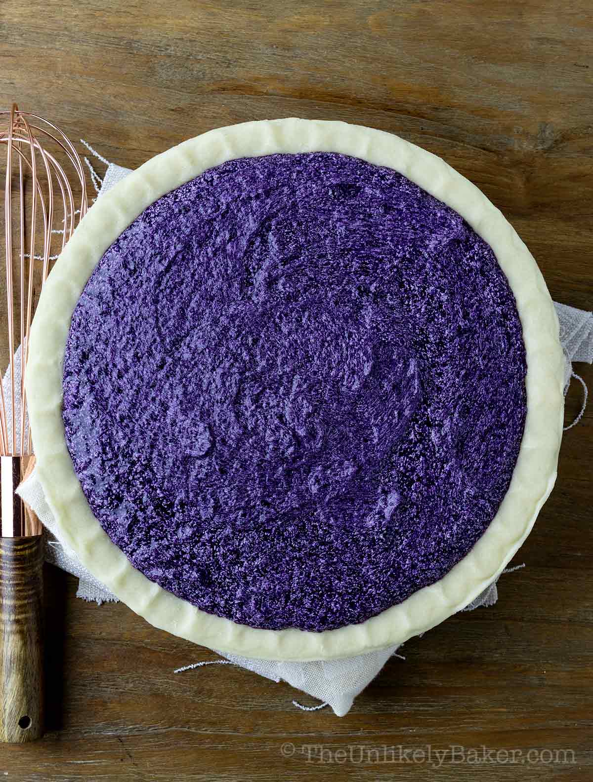 Ube pie filling on a 9-inch pie crust.