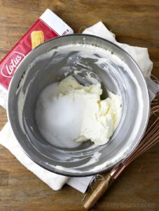 Sugar added to whipped cream cheese.