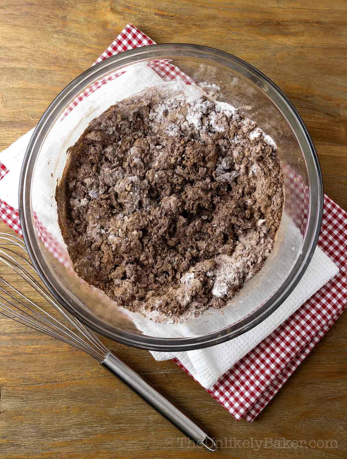 Partially mixed batter in a bowl.