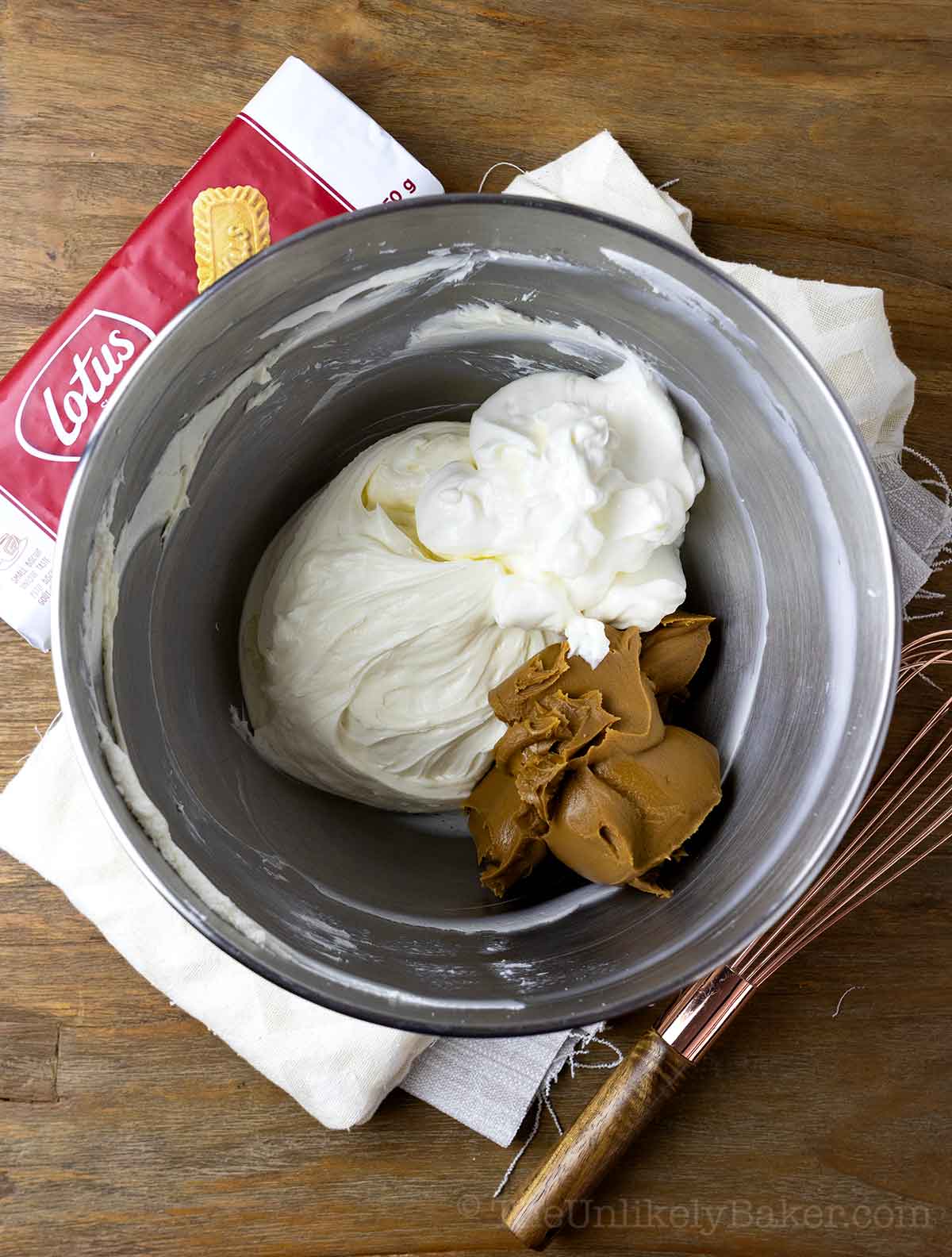 Sour cream and Biscoff added to cream cheese mixture.