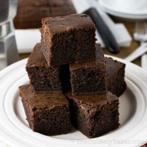 Slices of chocolate butter mochi on a plate.