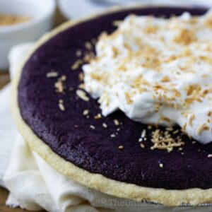 Ube pie with whipped coconut cream topping.