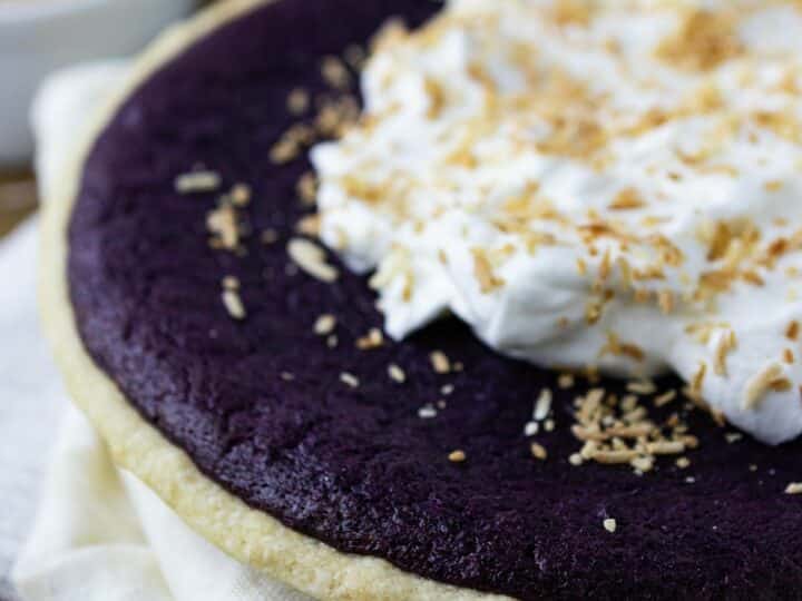 Ube pie with whipped coconut cream topping.