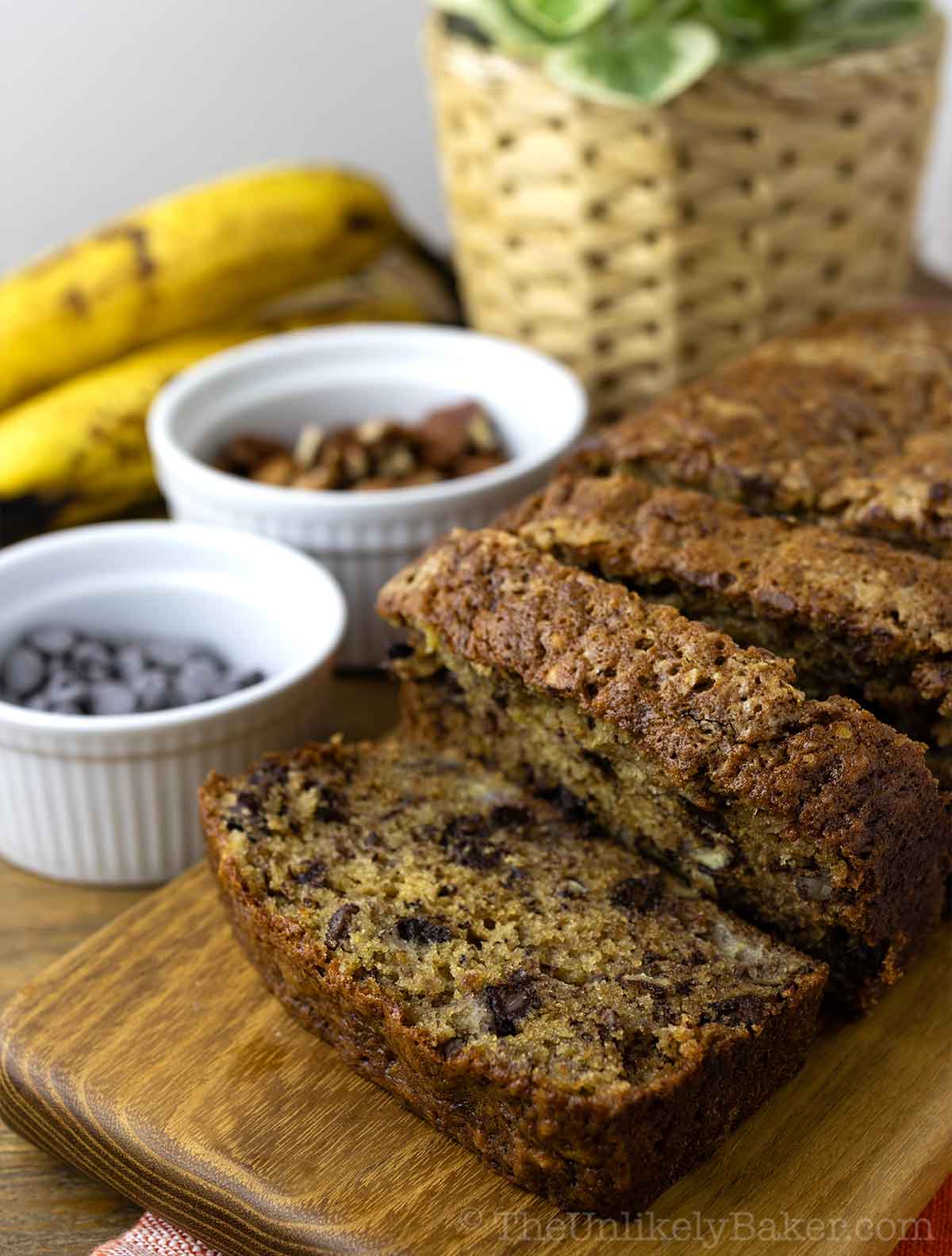 Banana pecan bread on a serving platter.