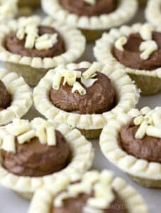 Mini tarts with whipped chocolate ganache filling.