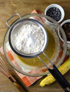 Dry ingredients sifted into wet ingredients.