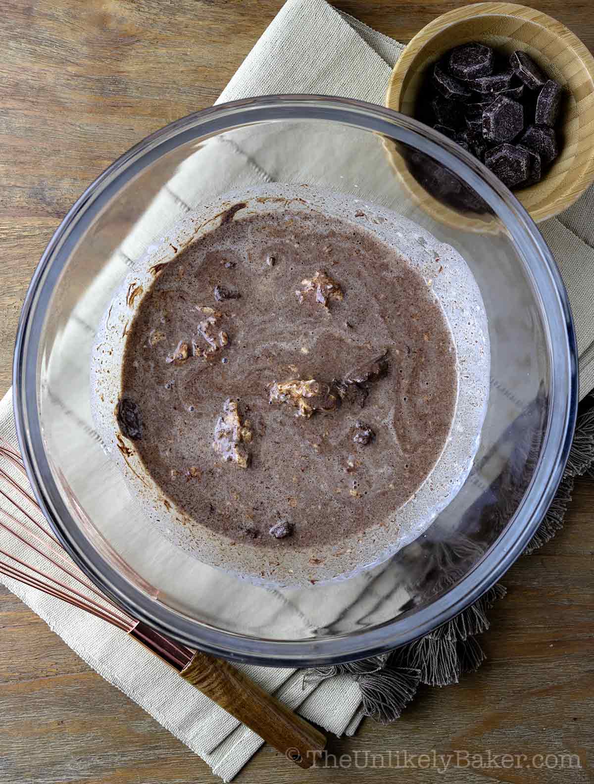 Melting chocolate in warm cream.