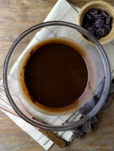 Smooth chocolate ganache in a bowl.