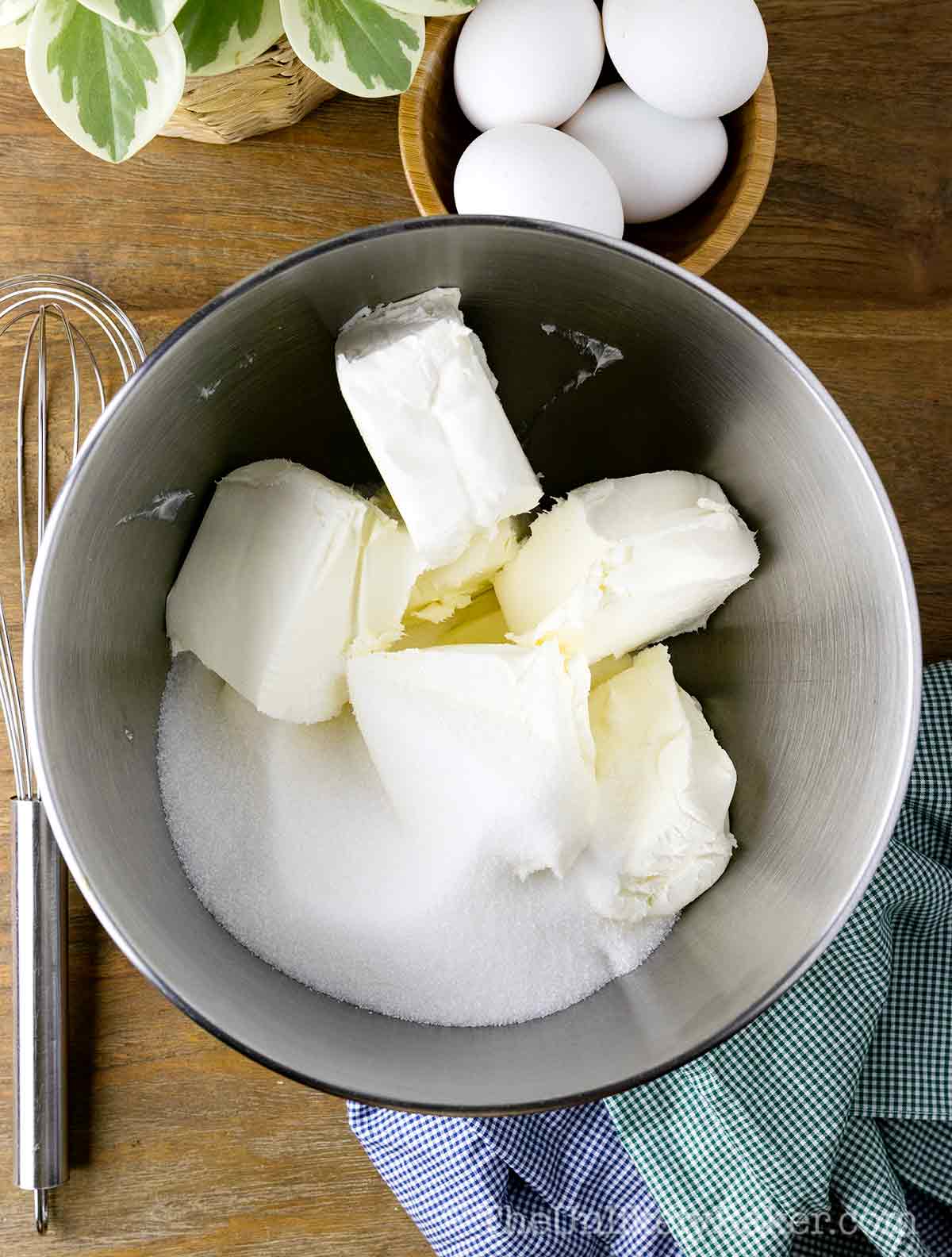 Sugar and cream cheese in a bowl.