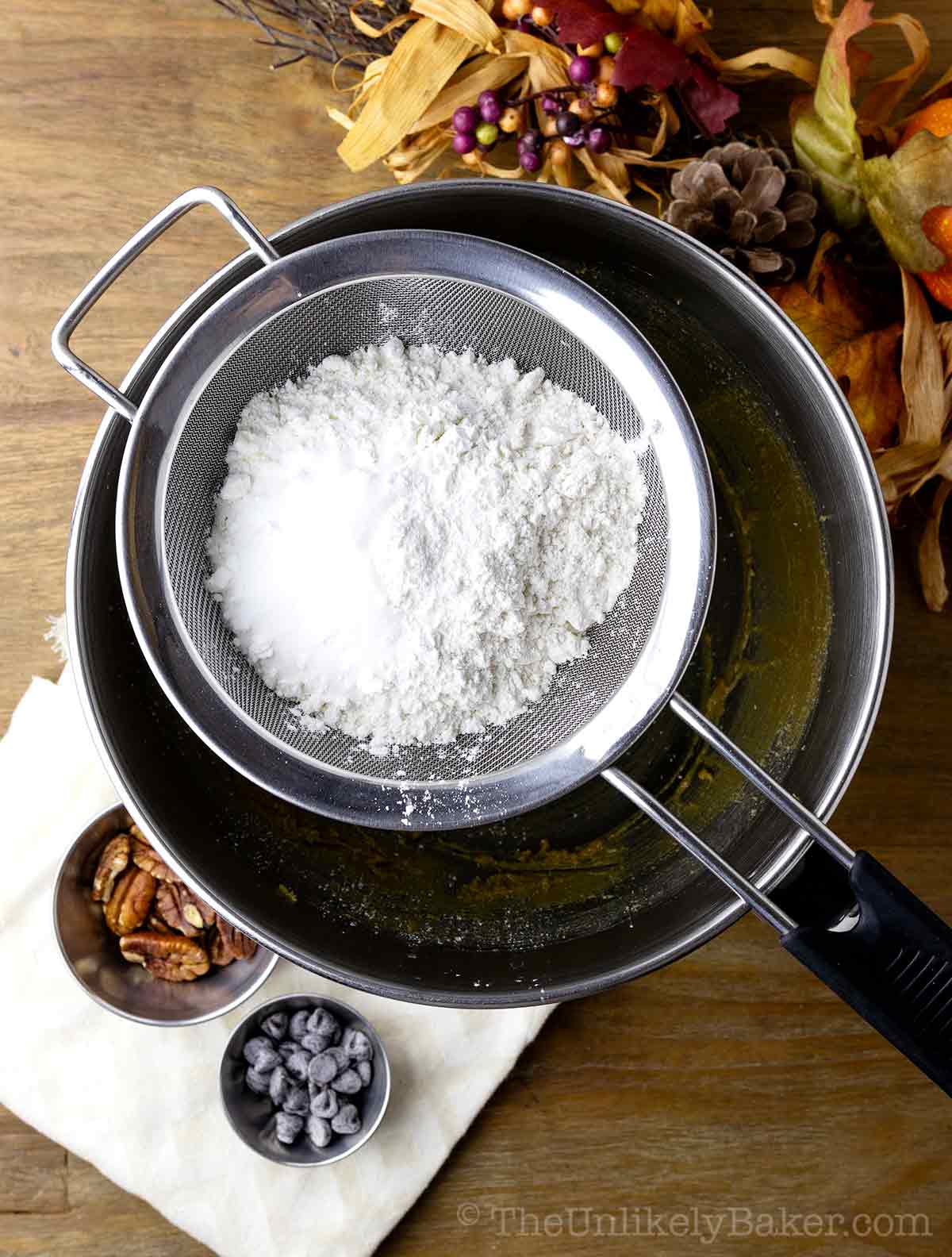 Dry ingredients sifted into wet ingredients.