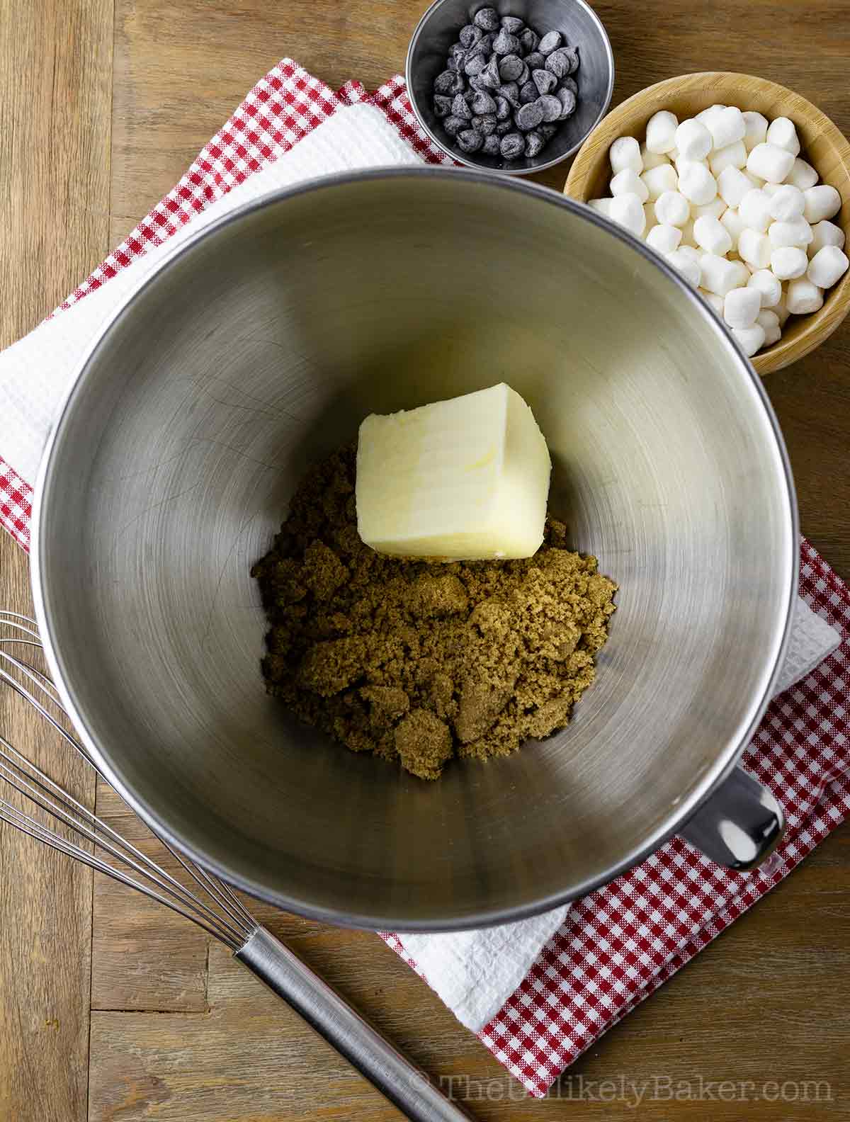 Butter and brown sugar in a bowl.