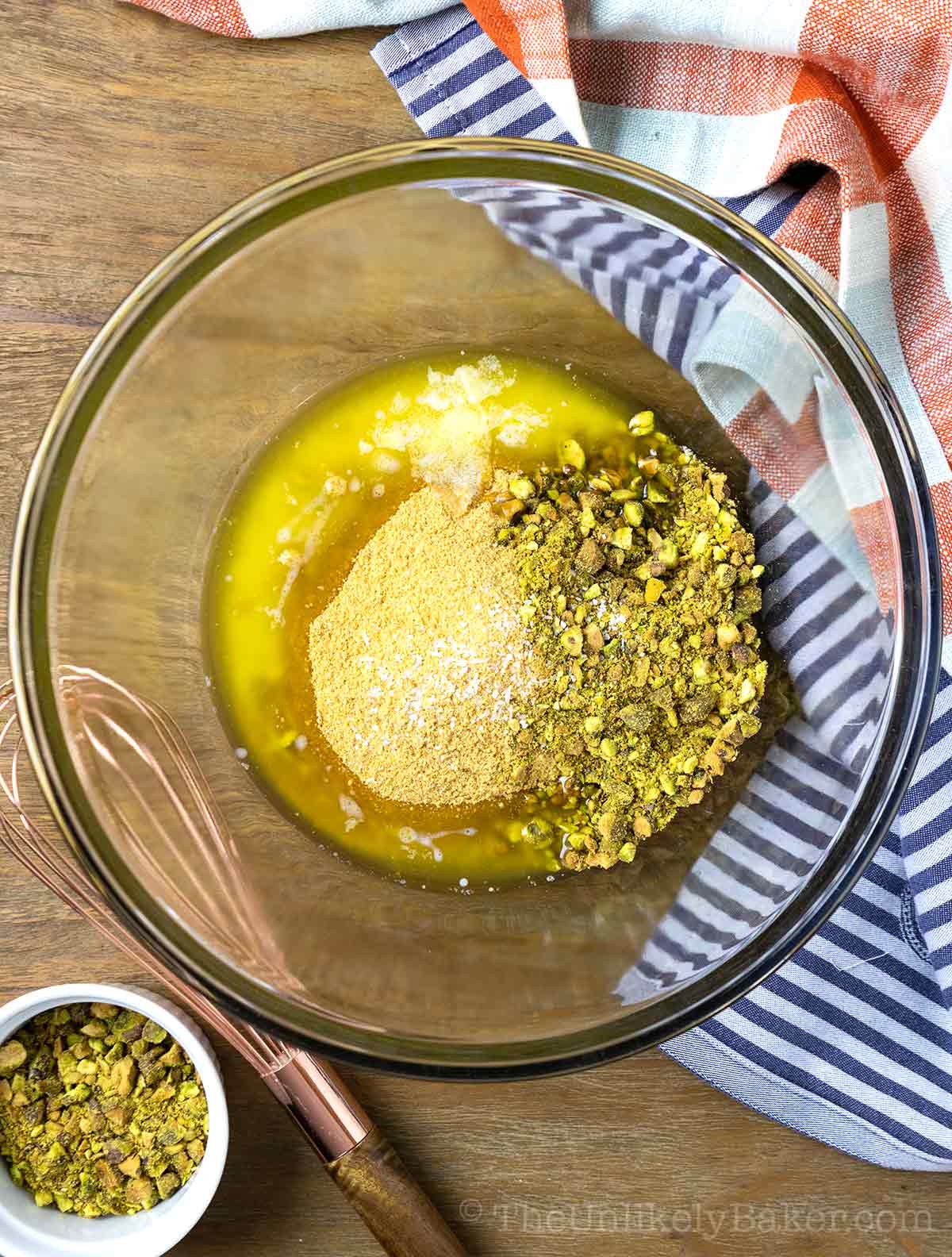 Pistachios and graham crumbs in a bowl.