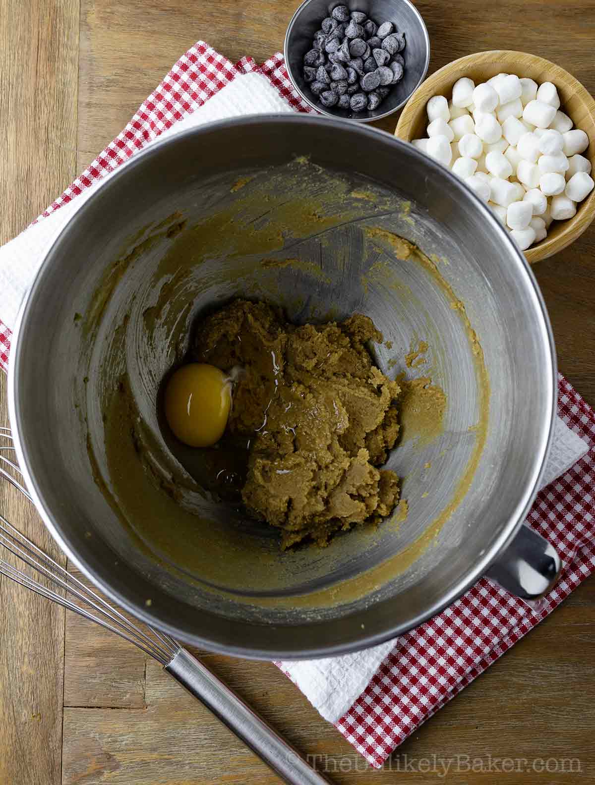 Egg and vanilla extract added to creamed butter.