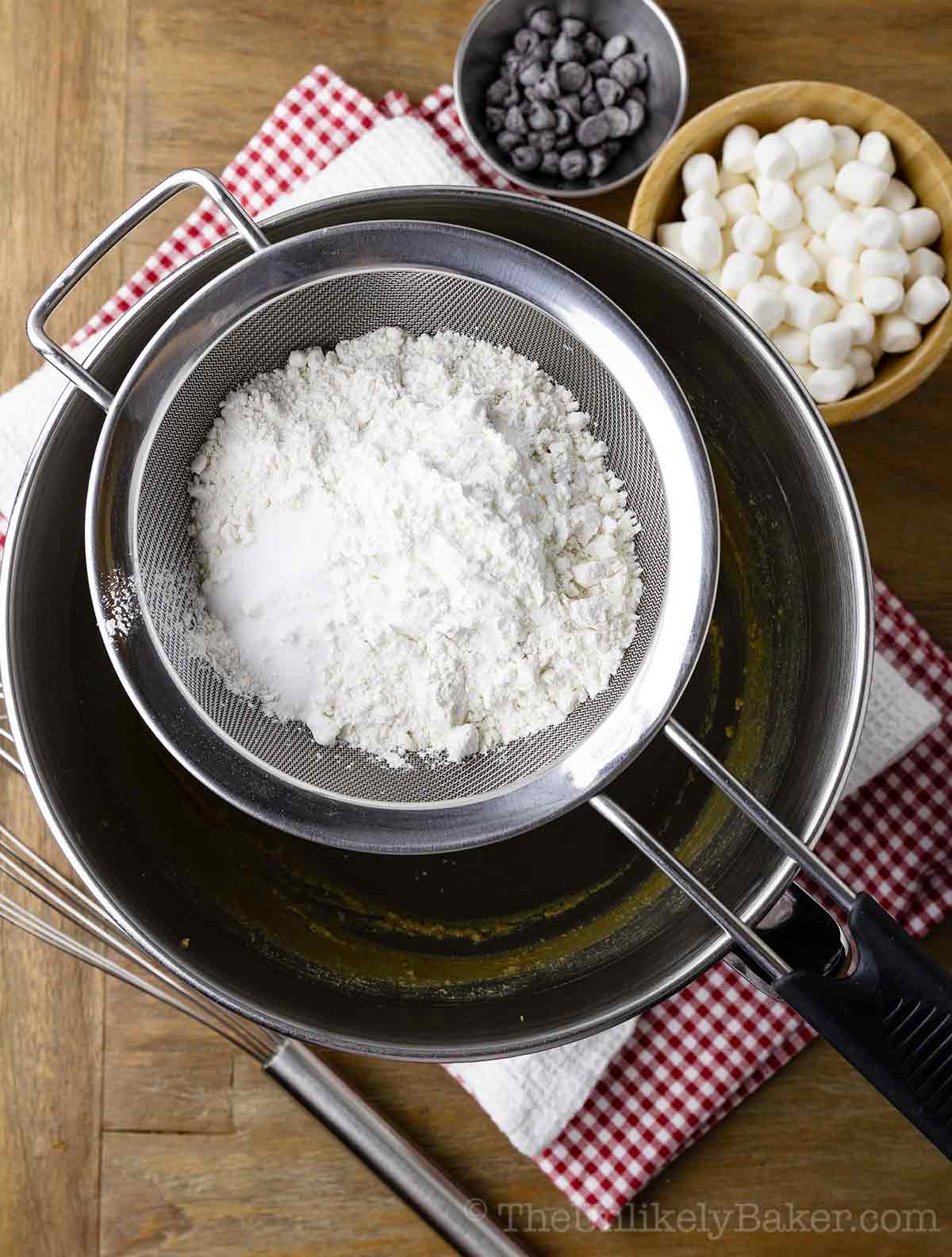 Flour mixture sifted into a bowl.