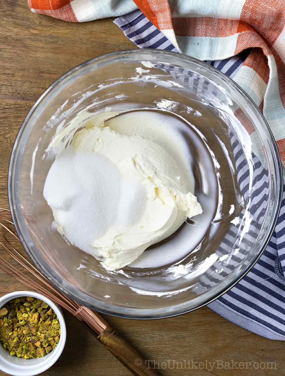 Sugar and cream cheese in a bowl.