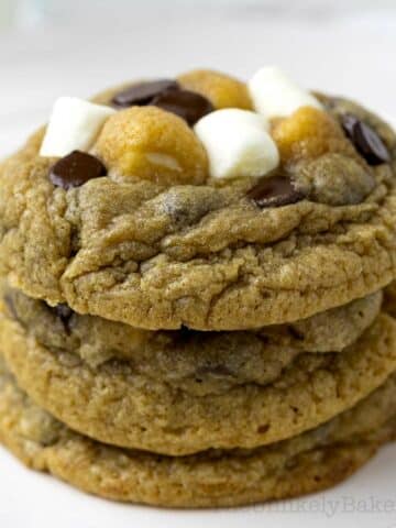 Stack of freshly baked chocolate chip marshmallow cookies.