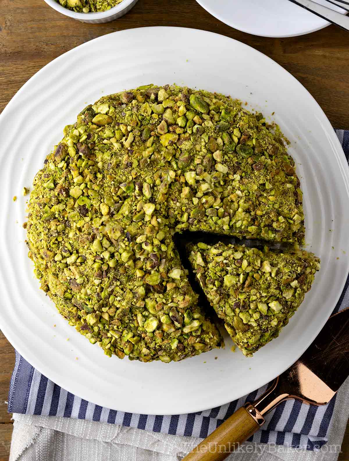 Overhead shot of pistachio sans rival cake.