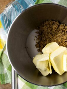 Butter and sugar in a bowl.