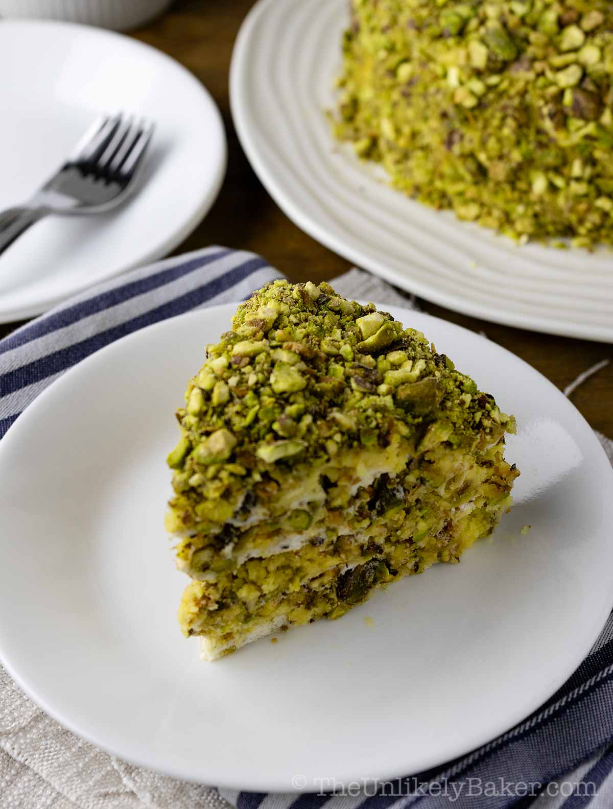 Sans rival pistachio on a plate.