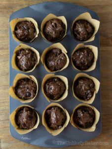 Muffin batter in a pan.