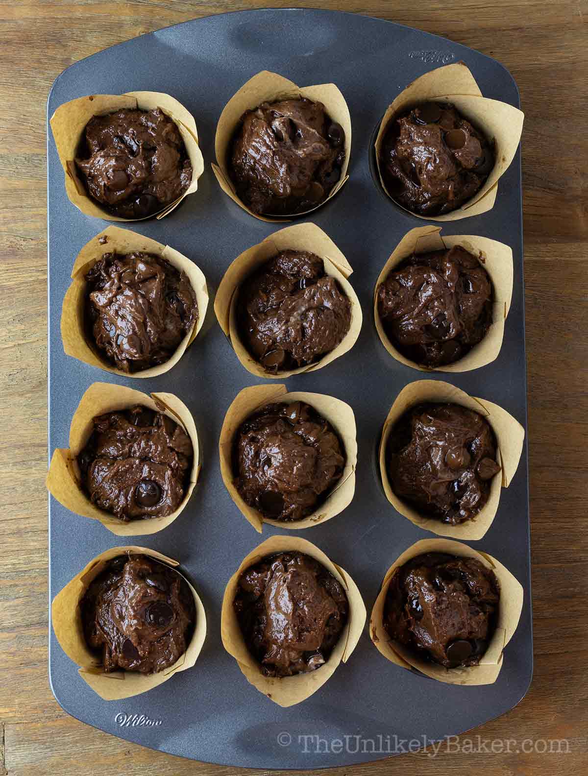 Muffin batter in a pan.