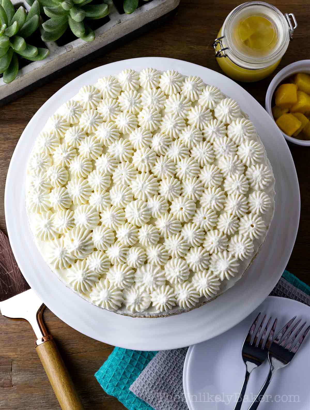 Filipino mango chiffon cake with mango whipped cream frosting.