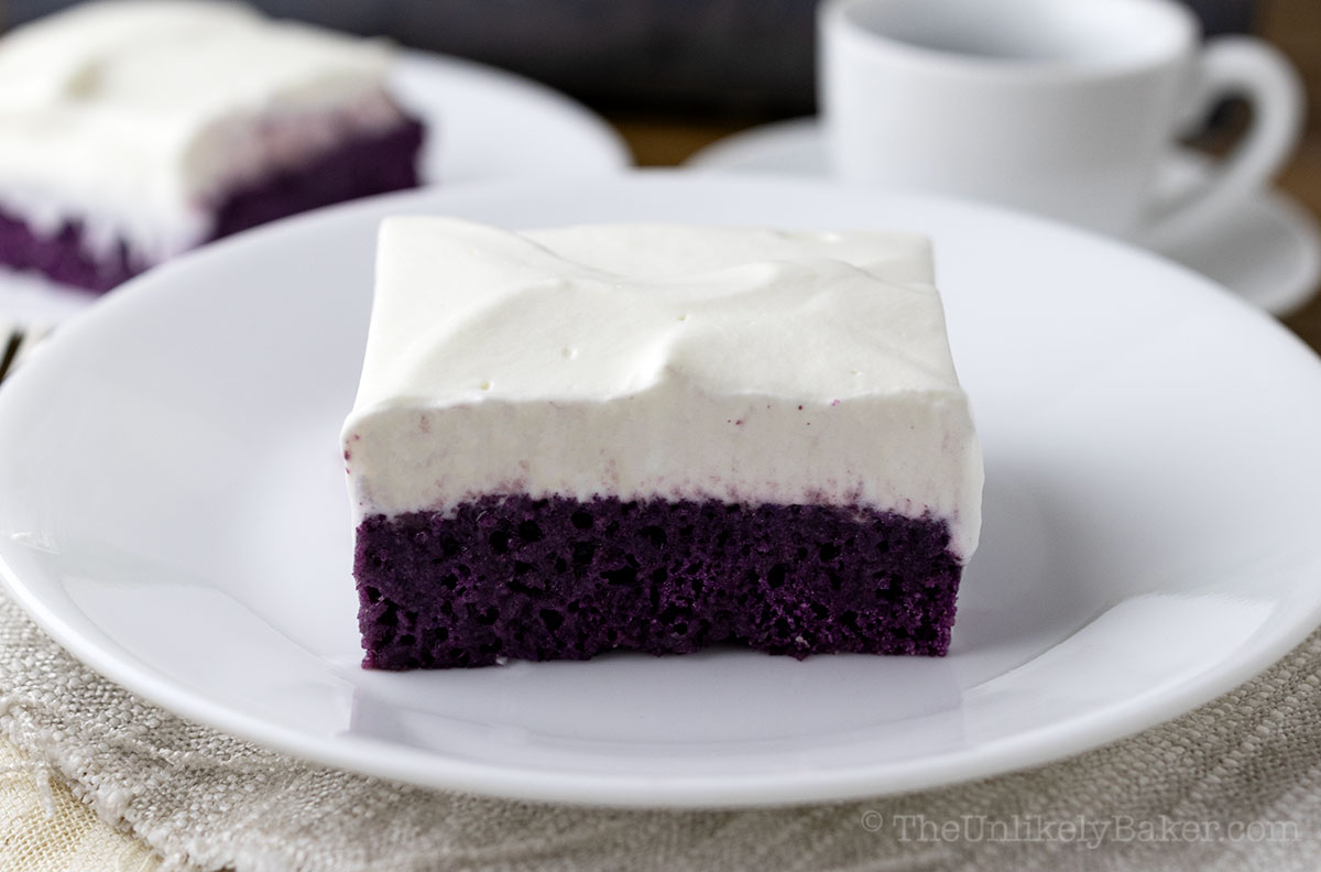 A slice of ube condensed milk cake.