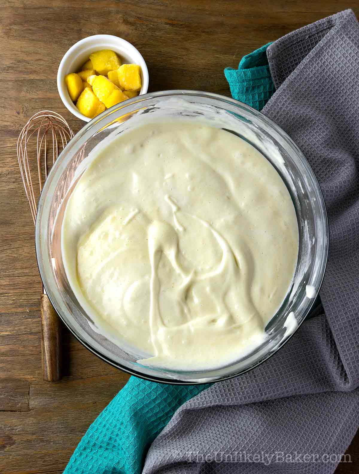 Mango chiffon cake batter in a bowl.