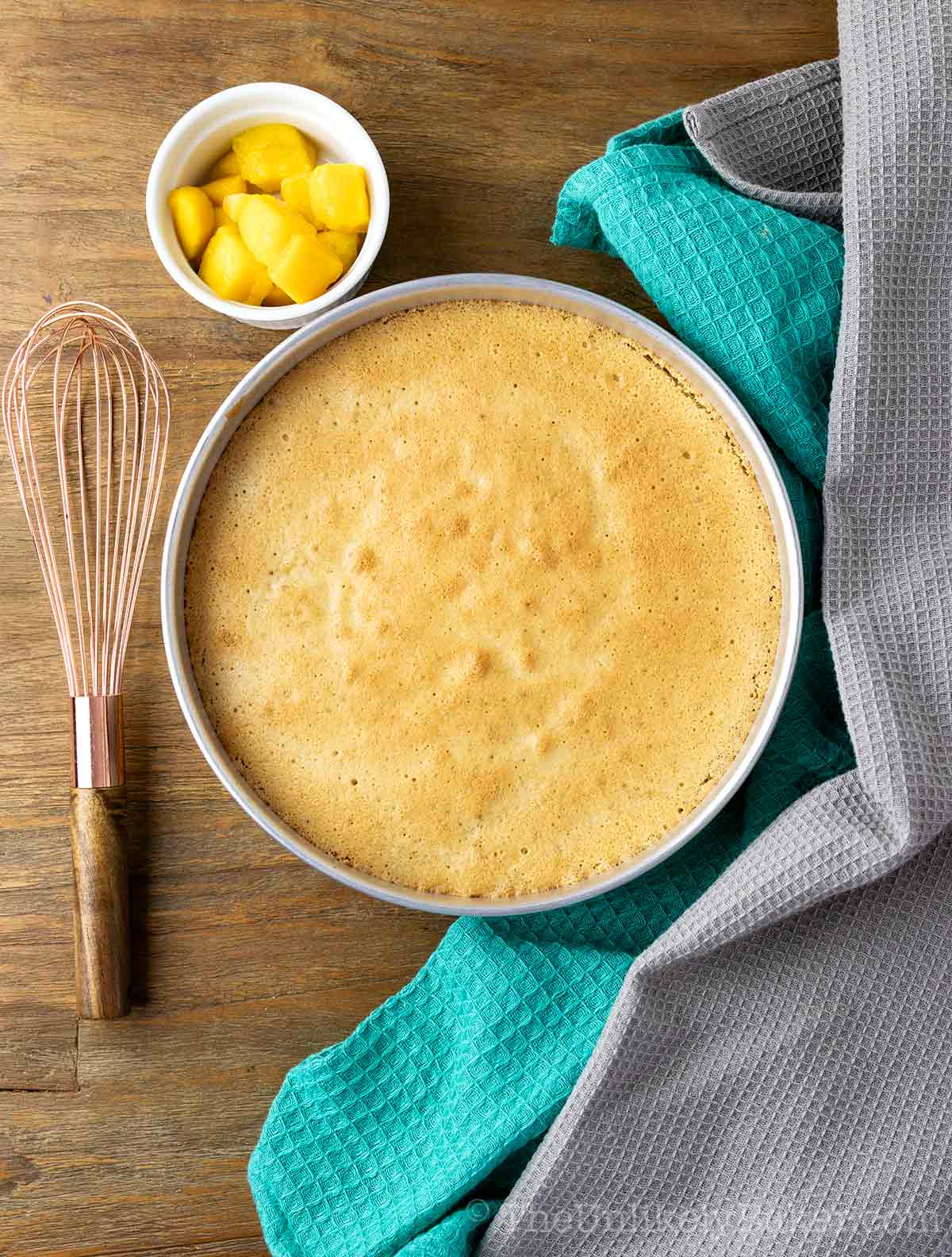 Freshly baked mango chiffon cake layer.