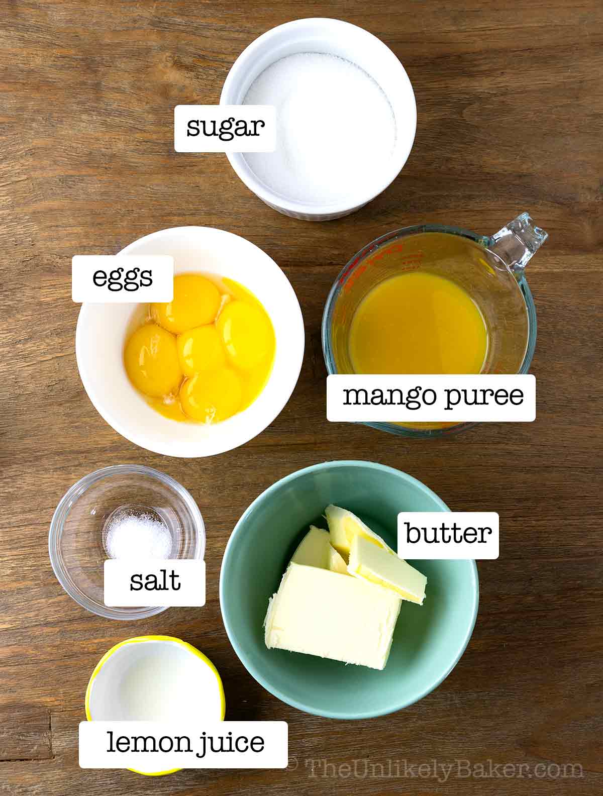 Ingredients to make mango curd recipe with text overlay.