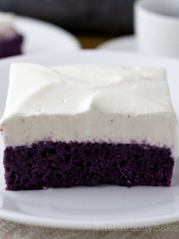 A slice of ube tres leches cake.