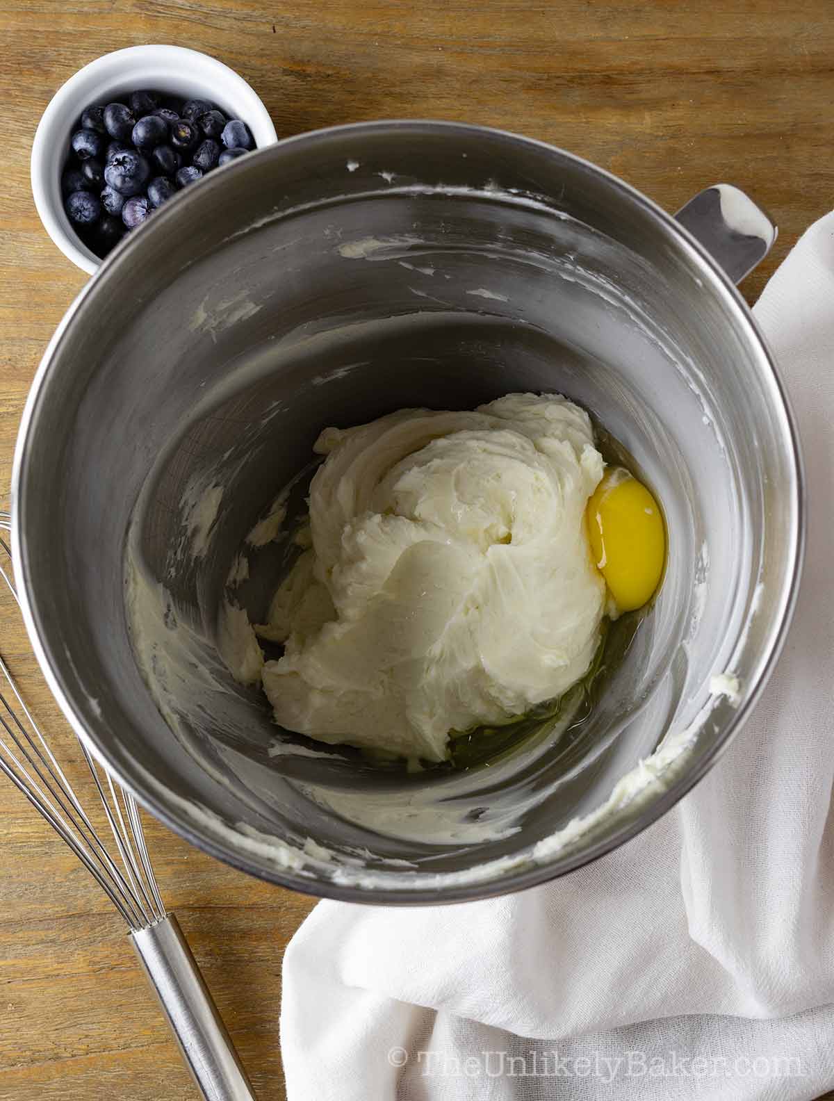 Eggs added to beaten cream cheese.