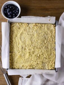 Freshly baked blueberry cream cheese crumb bars.